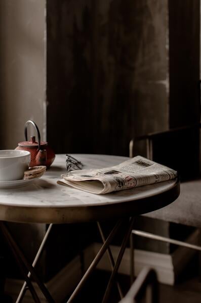 Newspaper and Table