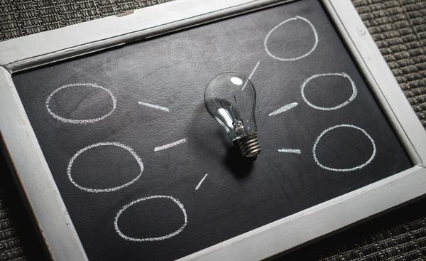 Black and White Board with light bulb